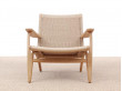 Mid-Century modern scandinavian arm chair in oak model CH 25 by Hans Wegner. New edition