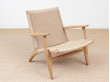 Mid-Century modern scandinavian arm chair in oak model CH 25 by Hans Wegner. New edition