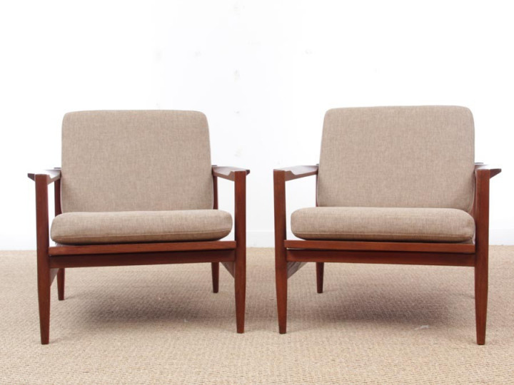 Paire de fauteuils scandinaves en teck Paire de fauteuils scandinaves en teck