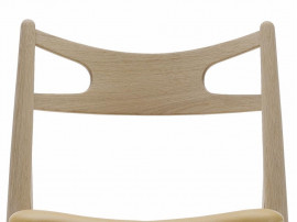 Mid-Century Modern CH 29 Sawback chair foamed seat by Hans Wegner. New product.