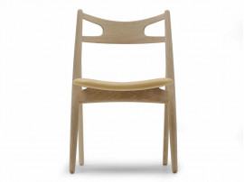 Mid-Century Modern CH 29 Sawback chair foamed seat by Hans Wegner. New product.