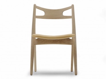 Mid-Century Modern CH 29 Sawback chair foamed seat by Hans Wegner. New product.