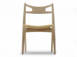 Mid-Century Modern CH 29 Sawback chair foamed seat by Hans Wegner. New product.