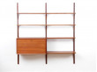 Mid century modern scandinavian wall system Cado in teak by Poul Cadovious