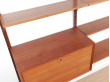 Mid century modern scandinavian wall system Cado in teak by Poul Cadovious