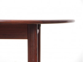 Mid-Century Modern danish extendable round dining table in Rio rosewood. 