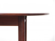 Mid-Century Modern danish extendable round dining table in Rio rosewood. 