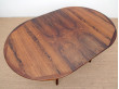 Mid-Century Modern danish extendable round dining table in Rio rosewood. 