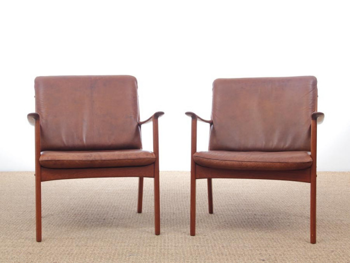 Mid-Century Modern Danish pair of  lounge chairs in teak model PJ 112 by Ole Wanscher