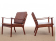 Mid-Century Modern Danish pair of  lounge chairs in teak model PJ 112 by Ole Wanscher