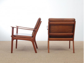 Mid-Century Modern Danish pair of  lounge chairs in teak model PJ 112 by Ole Wanscher