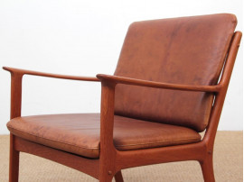 Mid-Century Modern Danish pair of  lounge chairs in teak model PJ 112 by Ole Wanscher