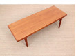 Table basse scandinave en teck. 