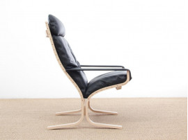 Mid modern century Siesta Classic armchair, hight back by Ingmar Relling. New edition.