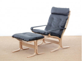 Mid modern century Siesta Classic armchair, hight back by Ingmar Relling. New edition.