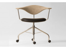 Mid-Century Modern PP502 Swivel chair by Hans Wegner. New product.