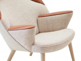 Mid-Century Modern PP521 upholstered Peacock chair by Hans Wegner. New product.