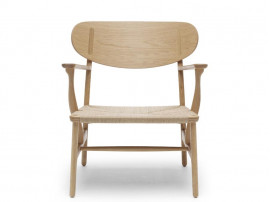 Fauteuil scandinave modèle CH 22. Edition neuve. 