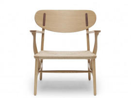 Fauteuil scandinave modèle CH 22. Edition neuve. 