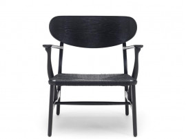 Fauteuil scandinave modèle CH 22. Edition neuve. 