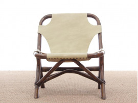 Pair of lounge chair in rattan and simili leather