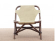 Pair of lounge chair in rattan and simili leather