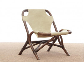 Pair of lounge chair in rattan and simili leather