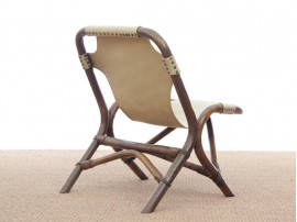 Pair of lounge chair in rattan and simili leather