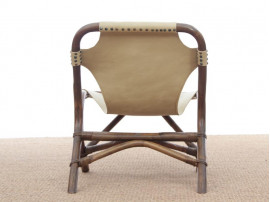 Pair of lounge chair in rattan and simili leather