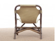 Pair of lounge chair in rattan and simili leather