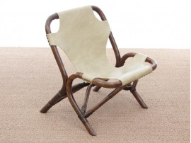 Pair of lounge chair in rattan and simili leather