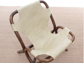 Pair of lounge chair in rattan and simili leather