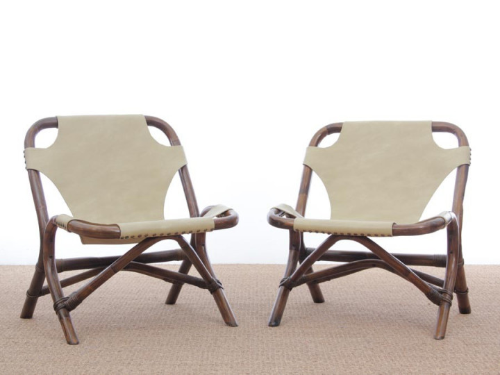 Pair of lounge chair in rattan and simili leather