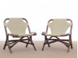 Pair of lounge chair in rattan and simili leather