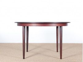 Mid-Century Modern danish extendable round dining table in Rio rosewood. 