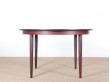 Mid-Century Modern danish extendable round dining table in Rio rosewood. 