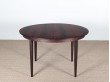 Mid-Century Modern danish extendable round dining table in Rio rosewood. 