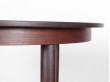 Mid-Century Modern danish extendable round dining table in Rio rosewood. 