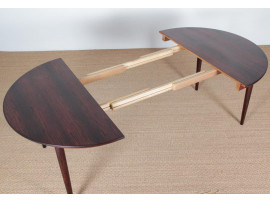 Mid-Century Modern danish extendable round dining table in Rio rosewood. 