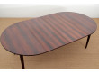 Mid-Century Modern danish extendable round dining table in Rio rosewood. 