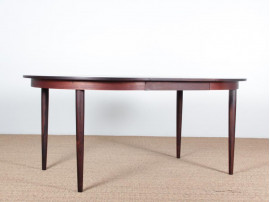 Mid-Century Modern danish extendable round dining table in Rio rosewood. 