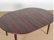 Mid-Century Modern danish extendable round dining table in Rio rosewood. 