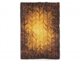 Rya rugs in wool with orange motifs.