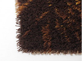 Rya rugs in wool with orange motifs.