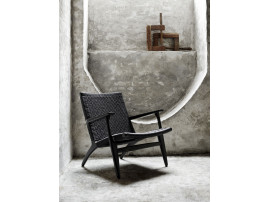 Mid-Century modern scandinavian arm chair in black lacquered oak model CH25 by Hans Wegner. New edition