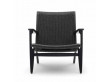 Fauteuil scandinave modèle CH25 en chêne laqué noir. Nouvelle édition.