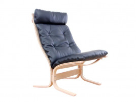 Mid modern century Siesta Classic armchair, hight back by Ingmar Relling. New edition.