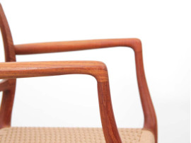 Suite de 4 fauteuils scandinaves en teck modèle 66